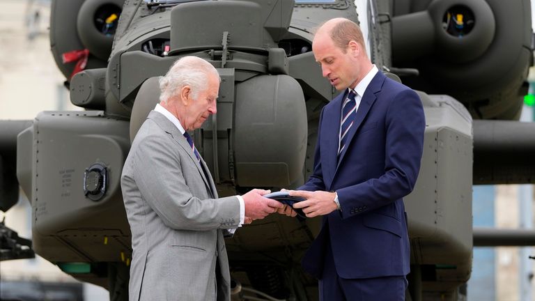 Pic: Kin Cheung/PA
King Charles III officially hands over the role of Colonel-in-Chief of the Army Air Corps to the Prince of Wales, in front of an Apache helicopter, during a visit to the Army Aviation Centre at Middle Wallop, Hampshire. Picture date: Monday May 13, 2024.