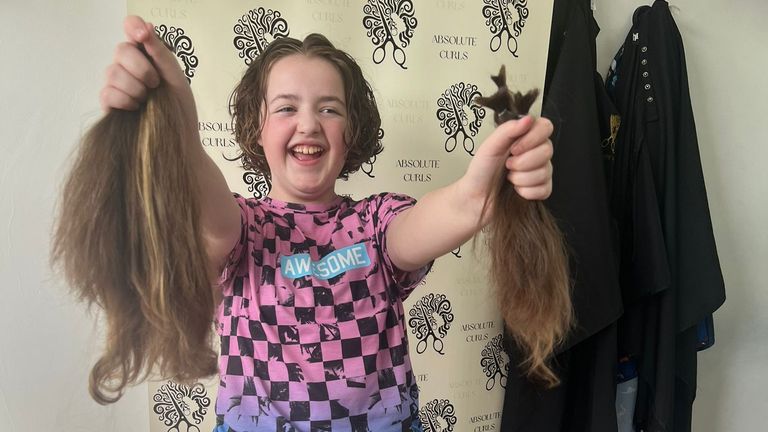 10-year-old Lexie Warwick-Oliver after she had her hair cut. Pic: PA