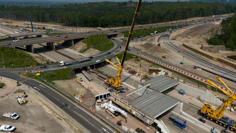 Engineering work taking place at the A3 Wisley interchange at Junction 10 of the M25 as concrete beams for a new bridge are installed. Pic: PA