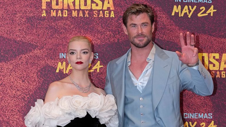 Anya Taylor-Joy, left, and Chris Hemsworth pose for photographers upon arrival at the UK Premiere of the film &#39;Furiosa: A Mad Max Saga&#39; in London, Friday, May 17, 2024. (AP Photo/Kin Cheung)