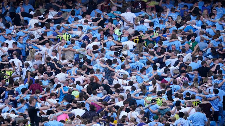 Manchester City fans celebrate during the last game of the season.  Photo: AP