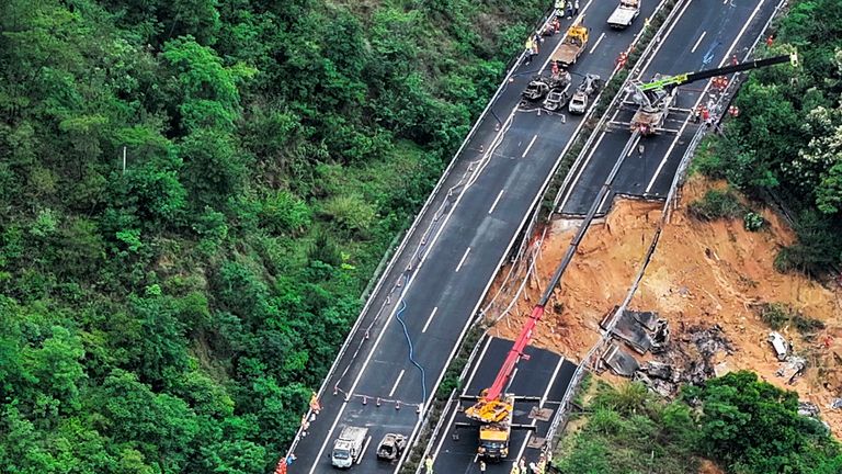 Rescuers work at the site of a collapsed road section of the Meizhou-Dabu Expressway in Meizhou, south China&#39;s Guangdong Province.
Pic:Xinhua News Agency/AP