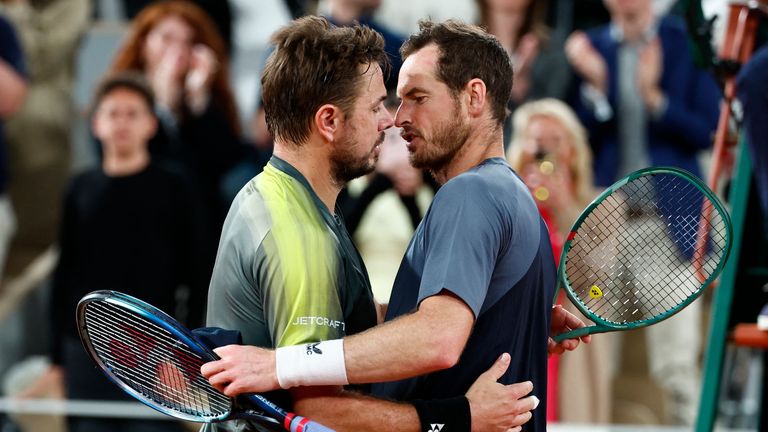 Stan Wawrinka (L) hugs Andy Murray after their French Open first round match.  Photo: Reuters