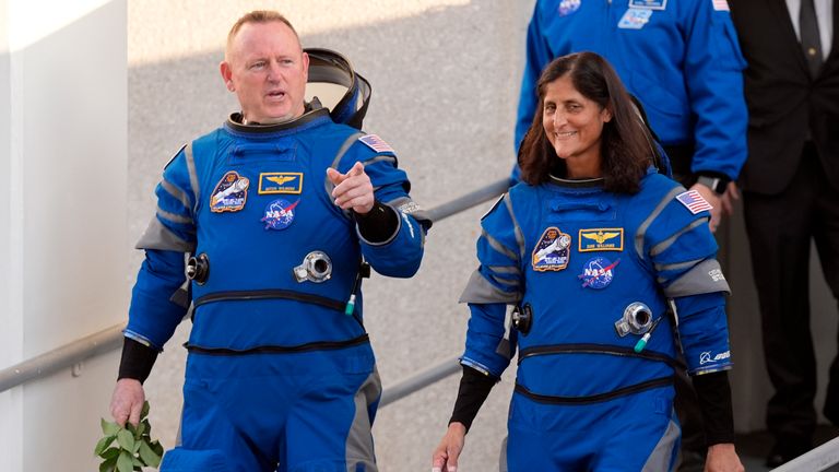 NASA astronauts Butch Wilmore, left, and Suni Williams leave the Operations and Checkout Building before heading to Space Launch Complex 41 to board Boeing's Starliner capsule atop an Atlas V rocket for a mission to the International Space Station in Cape Canaveral Space Force Station on Monday.  , May 6, 2024, in Cape Canaveral, Florida (AP Photo/John Raoux)