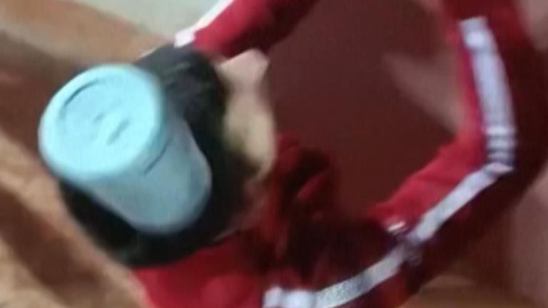 Water bottle falls on Novak Djokavic&#39;s head as he signs autographs