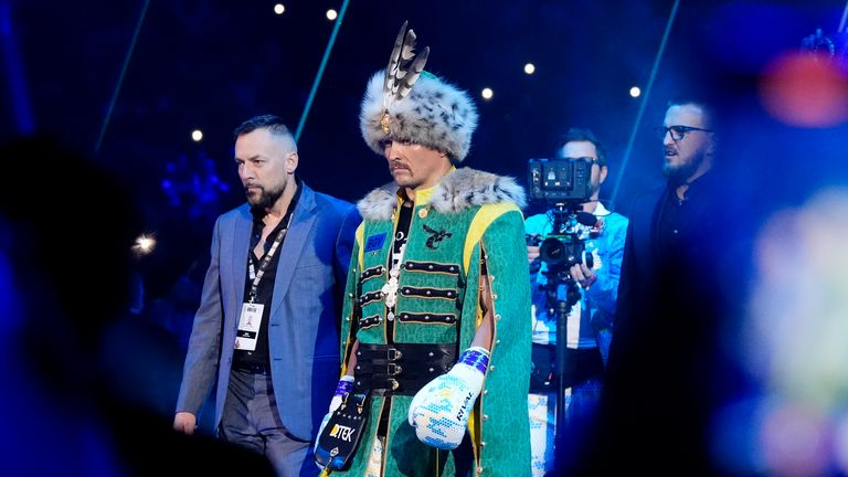 Usyk arrived dressed as a Cossack. Pic: PA