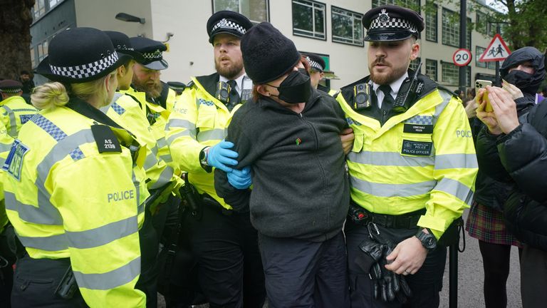 Police remove a protester.
Pic: PA