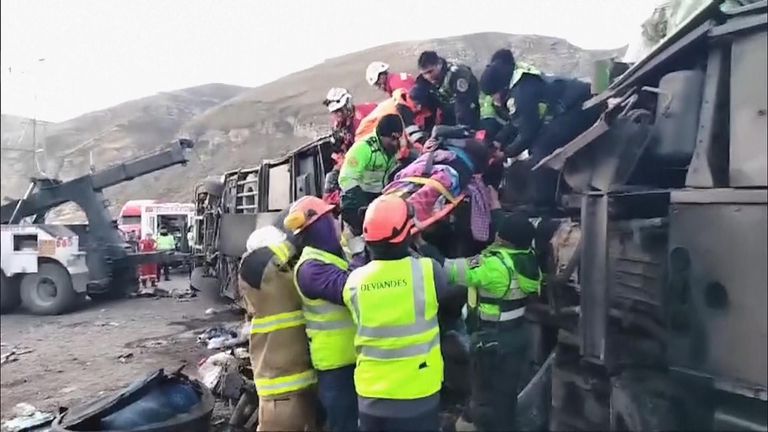 Four people were killed and more than 30 others were injured after a passenger bus and a cargo train collided Sunday in central Peru, the country&#39;s national police said.