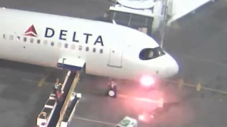 Fire bursts out under the nose of a Delta Airlines flight from Mexico