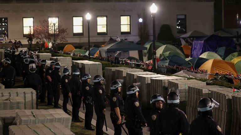Police stand guard near a camp of protesters supporting Palestinians on the grounds of Columbia University, during the ongoing conflict between Israel and the Palestinian Islamic group Hamas, in New York City, USA, April 30, 2024. REUTERS /Caitlin Ochs