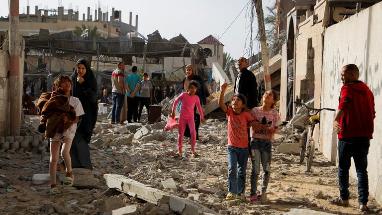 Residents in Rafah after an Israeli air strike on Sunday. Pic: Reuters