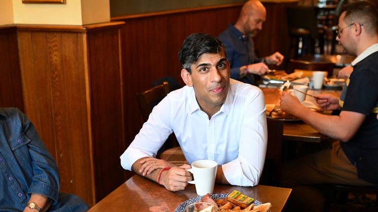 Prime Minister Rishi Sunak (centre) meeting veterans at a community breakfast in his constituency of Northallerton, North Yorkshire, during the general election campaign.  Photo date: Saturday, May 25, 2024.