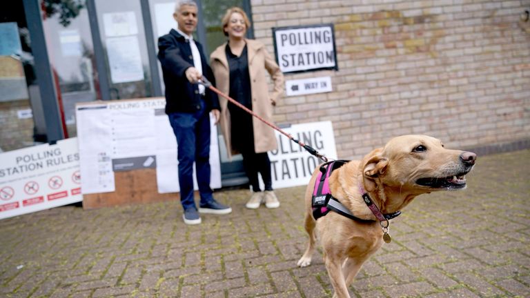 Sadiq Khan with his wife Saadiya Khan and dog Luna, at the polling station at St Alban&#39;s Church.
Pic: PA