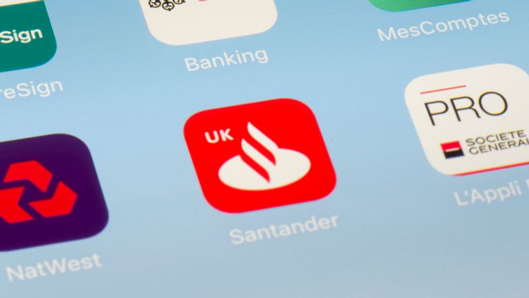 A photo of a mobile phone device with bank apps including Santander. Pic: iStock