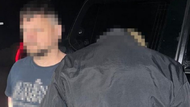 One of the alleged agents being detained in pictures released by the SBU. Pic: Telegram/SBU