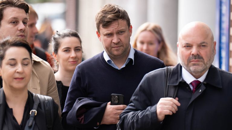 Scott Law, 43 (centre) arrives at Highbury Corner Magistrates&#39; Court, north London, where he is accused of headbutting football pundit and former Manchester United midfielder Roy Keane, at the Emirates Stadium on September 3 last year. Picture date: Wednesday May 29, 2024. The charge relates to an incident at Emirates Stadium on September 3 last year, following Arsenal&#39;s 3-1 victory over Manchester United, where Keane was working as a pundit. Footage was posted on social media of fellow Sky Spor