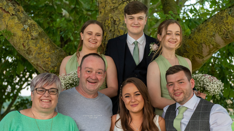 Sammie, David and Georgia (back row) and Fiona Scott, husband Steve, stepdaughter Lauren and her husband Gareth (front row) 