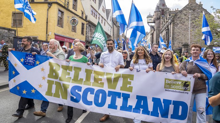 First Minister of Scotland Humza Yousaf (centre) takes part in a Believe in Scotland march from Edinburgh Castle in Edinburgh. Picture date: Saturday September 2, 2023.