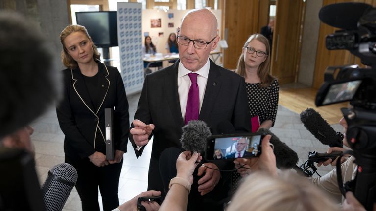John Swinney speaks to the media after being voted in as First Minister at the Scottish Parliament in Edinburgh. Picture date: Tuesday May 7, 2024.