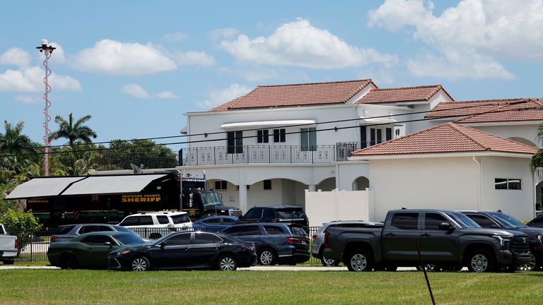 Sean Kingston's home in Southwest Ranches, Florida, is shown during a Broward Sheriff's Office raid on Thursday, May 23, 2024. A SWAT team raided rapper Kingston's rented mansion on Thursday.  and arrested his mother on fraud and theft charges that a lawyer says stemmed in part from installing a huge television in the house.  Broward County detectives arrested Janice Turner, 61, at the home.  (Amy Beth Bennett/South Florida Sun-Sentinel via AP)