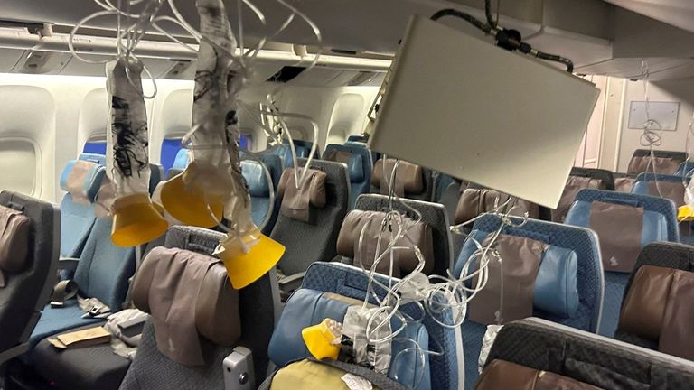 The interior of Singapore Airline flight SQ321 is pictured after an emergency landing at Bangkok&#39;s Suvarnabhumi International Airport, Thailand, May 21, 2024. REUTERS/Stringer REFILE – CORRECTING FLIGHT NUMBER FROM "SG321" TO "SQ321
