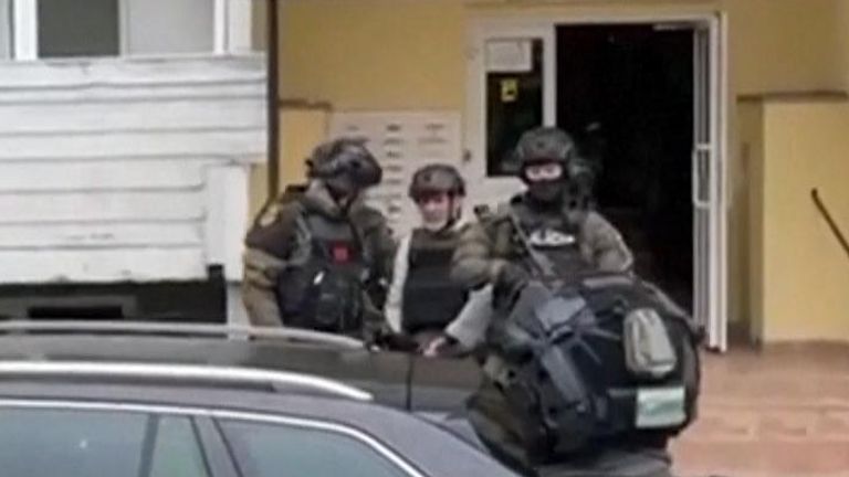 Slovak police bring suspect in prime minister assassination attempt home to search apartment