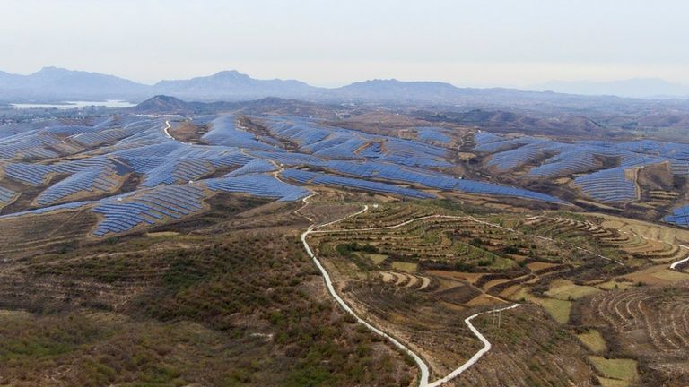 Solar farm operates next to Donggou village near Shijiazhuang city in the northern China&#39;s Hebei province, Friday, Nov. 10, 2023. (AP Photo/Ng Han Guan)