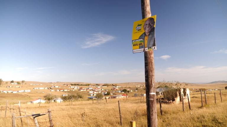 An ANC poster over Qunu

 