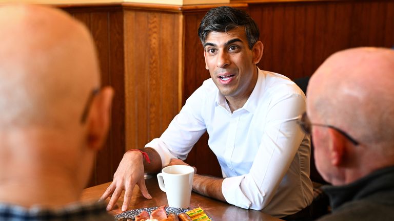 Prime Minister Rishi Sunak (centre)meeting veterans at a community breakfast in his constituency in Northallerton, North Yorkshire, while on the General Election campaign trail. Picture date: Saturday May 25, 2024.