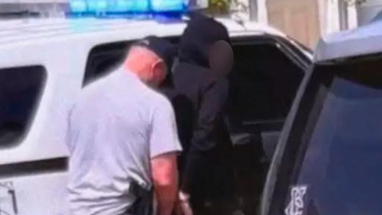 The suspect was detained following the incident. Pic: NBC News