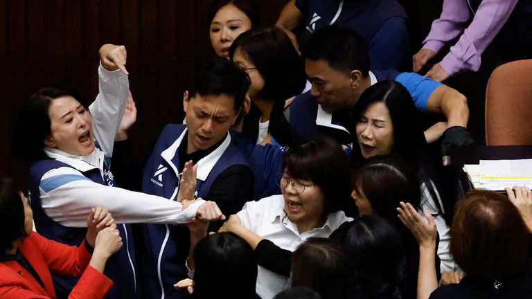 Taiwan lawmakers argue and exchange blows during a parliamentary session in Taipei, Taiwan May 17, 2024. REUTERS/Ann Wang