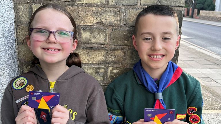 Teddy and Hope with their NatWest Rooster cards