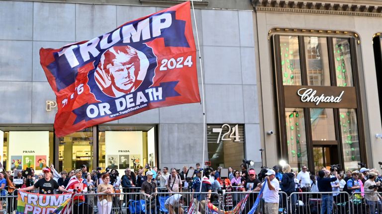 Ahead of the 11 am post hush money trial guilty verdict press conference today, Trump supporters and others gather outside of Trump Tower on Fifth Avenue. Pic: AP 