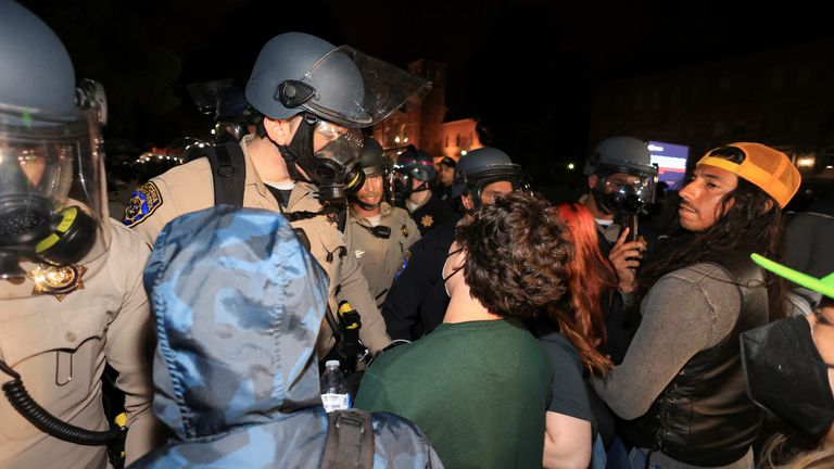 Pro-Palestinian protesters face off with CHP officers near an encampment at UCLA
Pic: Reuters