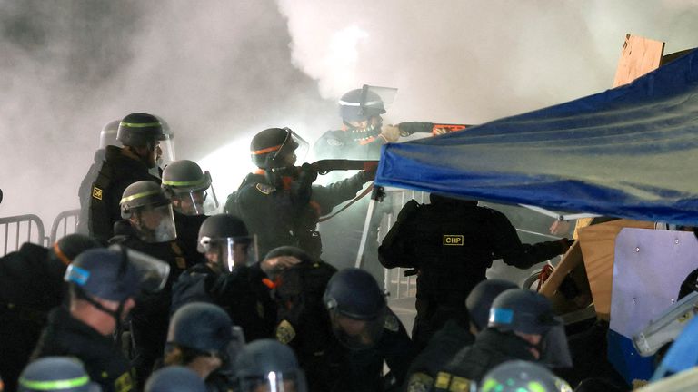 Law enforcement officials clash with demonstrators, as they try to enter the protest encampment in support of Palestinians at the University of California Los Angeles (UCLA), as the conflict between Israel and the Palestinian Islamist group Hamas continues, in Los Angeles, California, U.S., May 2, 2024. REUTERS/David Swanson