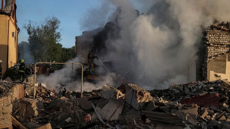 Firefighters work at a site of a Russian missile strike, amid Russia&#39;s attack on Ukraine, in Kharkiv, Ukraine May 10, 2024. REUTERS/Vyacheslav Madiyevskyy
