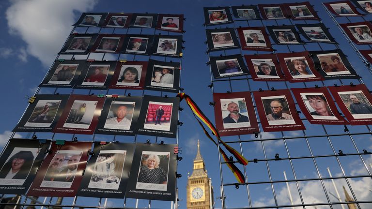 Images of those affected by the contaminated blood scandal are displayed during a vigil to remember the victims on Sunday. Pic: Reuters

