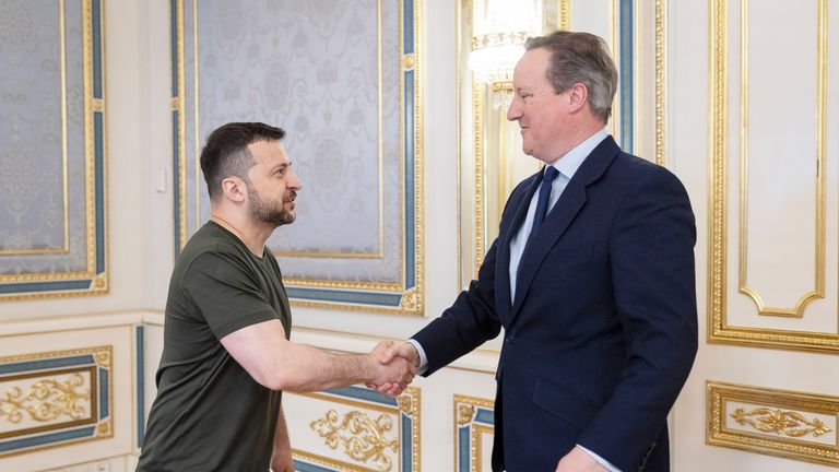 In this photo provided by the Ukrainian Presidential Press Office, Ukrainian President Volodymyr Zelenskyy, left, shakes hands with British Foreign Secretary David Cameron in Kiev, Ukraine, Thursday, May 2, 2024. (Ukrainian Presidential Press Office via AP)