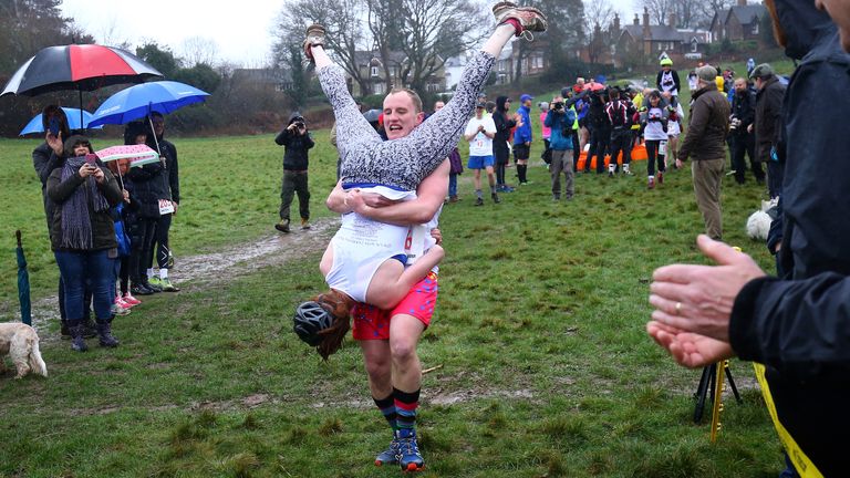 UK Wife Carrying Race 2019
Competitors take part in the annual UK Wife Carrying Race at The Nower in Dorking, Surrey.
Picture by: Gareth Fuller/PA Archive/PA Images
Date taken: 03-Mar-2019
