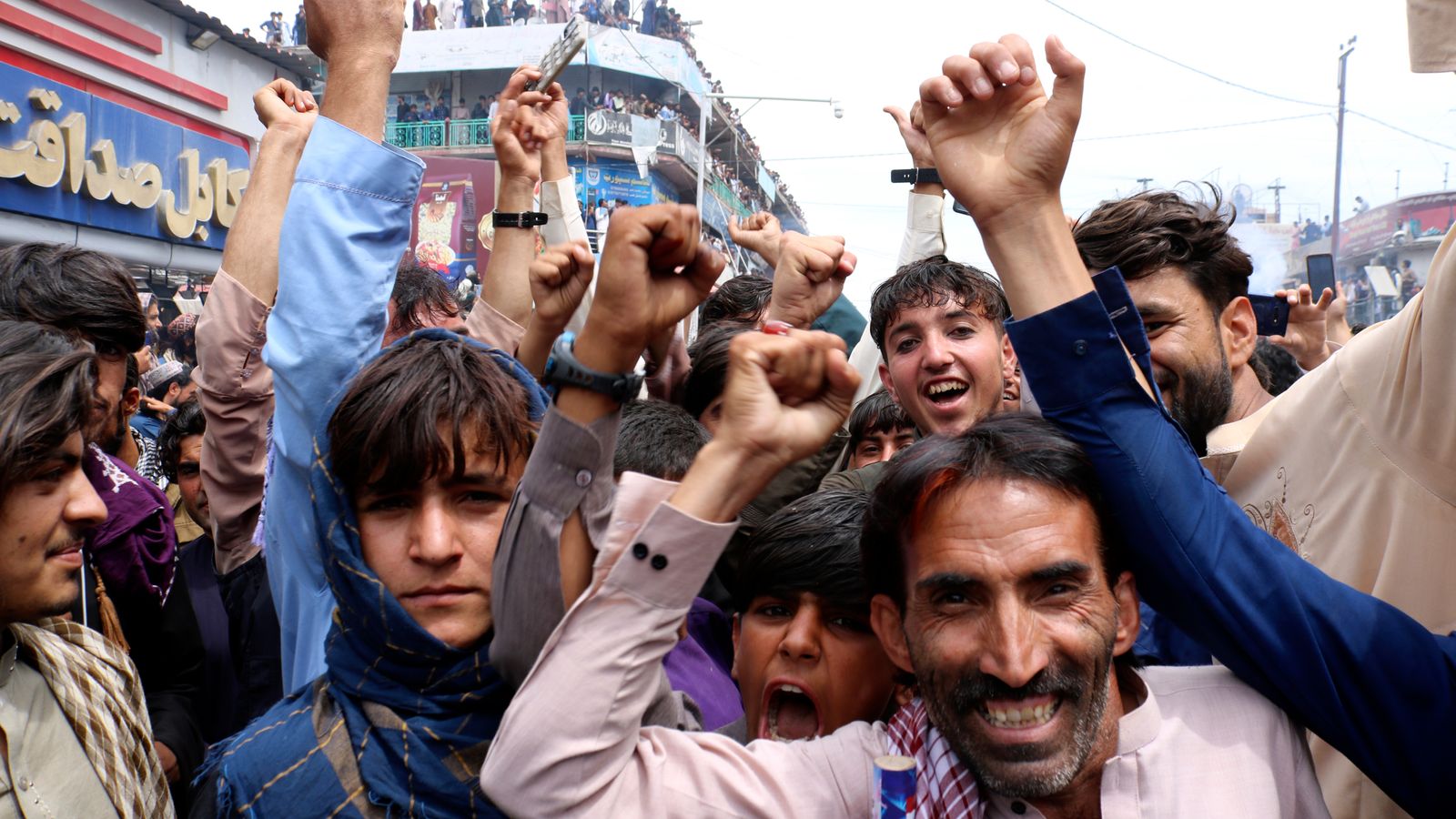 Afghans celebrate in their thousands as men's cricket team reach first T20 World Cup semi-finals