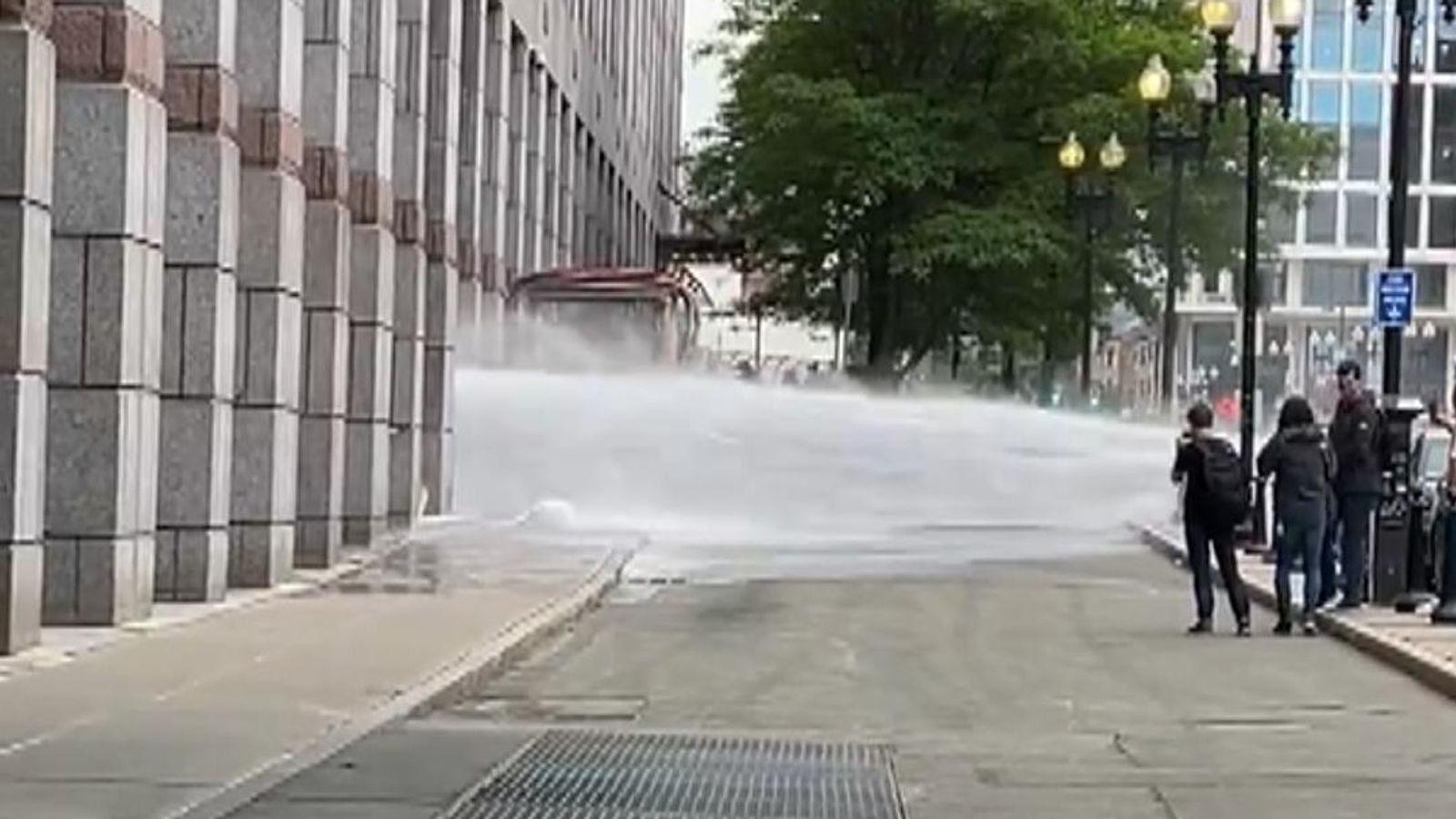 Boston: Water spews onto street out of building after main break | US ...