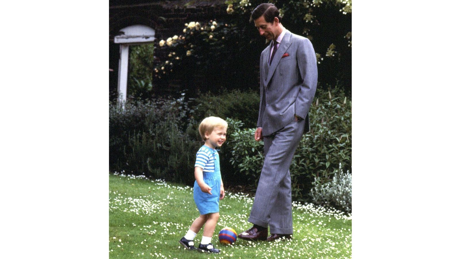 Prince William posts picture of him as a boy playing football with King to mark Father's Day