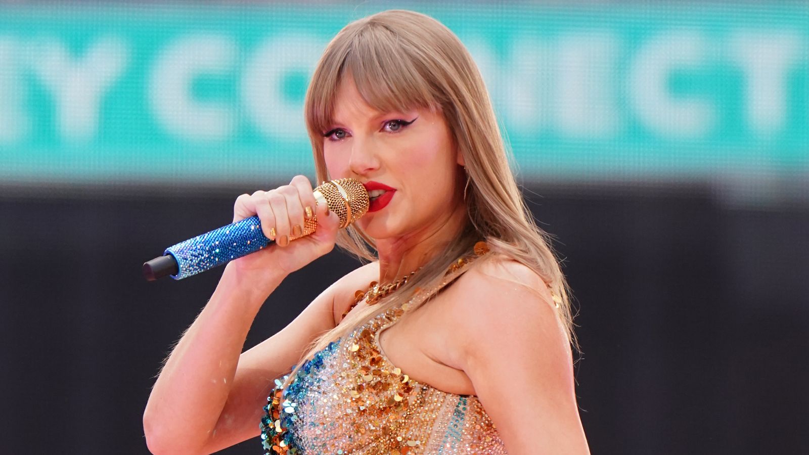 Taylor Swift brings Travis Kelce on stage for the first time - sending fans into a frenzy