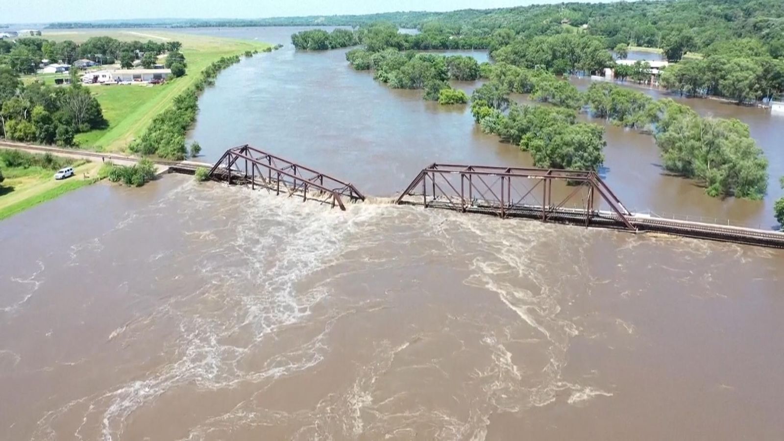 US: Railroad bridge collapses following severe flooding in South Dakota ...