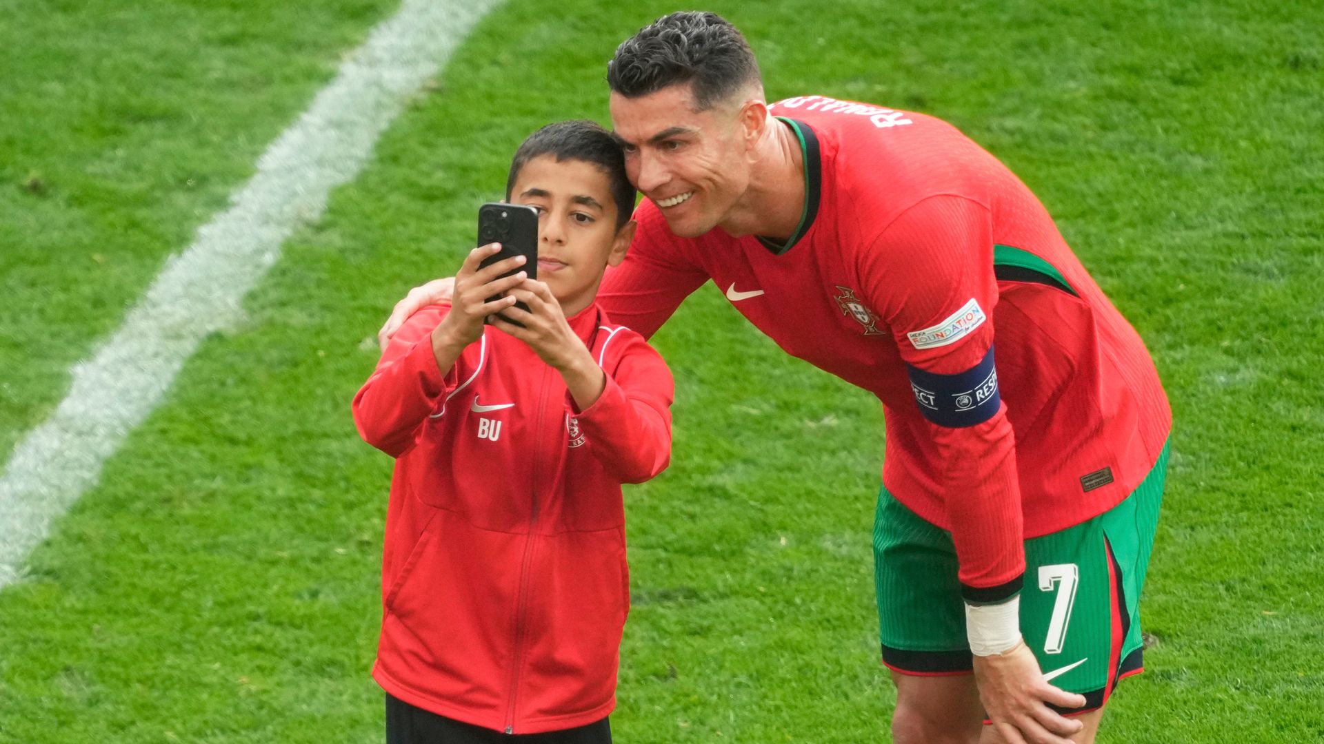 Pitch invaders keen for selfies with Ronaldo cause chaos at Euro 2024 match