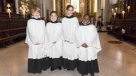 Choristers Lila (second right), 11, and Lois, 10 at St Paul's Cathedral in London.
Pic: PA