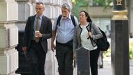 Gareth Jenkins (centre) is seen arriving to give evidence to the inquiry earlier this week. Pic: PA