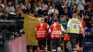 A sheet is put up by stewards as Hungary's Barnabas Varga is stretchered off after an injury against Scotland at Euro 2024. Pic: Reuters