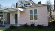 In this March 18, 2016 photo, the childhood home of Muhammad Ali is seen in Louisville, Ky. The house where Ali grew up dreaming of boxing fame is up for sale. The house was converted into a museum offering a glimpse into the boxing great's formative years. It went on the market Tuesday, June 4, 2024 along with two neighboring homes.  (AP Photo/Dylan Lovan)