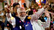 Prime Minister Narendra Modi greets supporters. Pic: AP